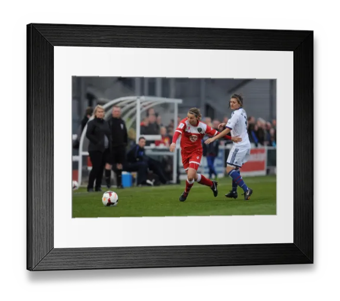 Framed Print : Bristol Academy's Loren Dykes Outruns Hannah Blundell of Chelsea Ladies in FA WSL Clash Framed Print : Bristol Academy's Loren Dykes Outruns Hannah Blundell of Chelsea Ladies in FA WSL Clash