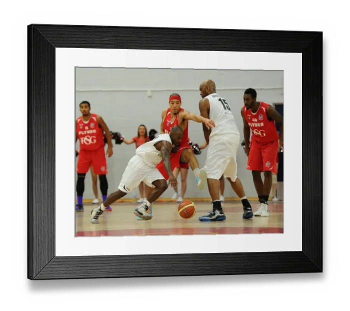 Framed Print : Bristol Flyers vs Manchester Giants: A Hard-Fought Basketball Battle - Greg Streete's Intense Moment