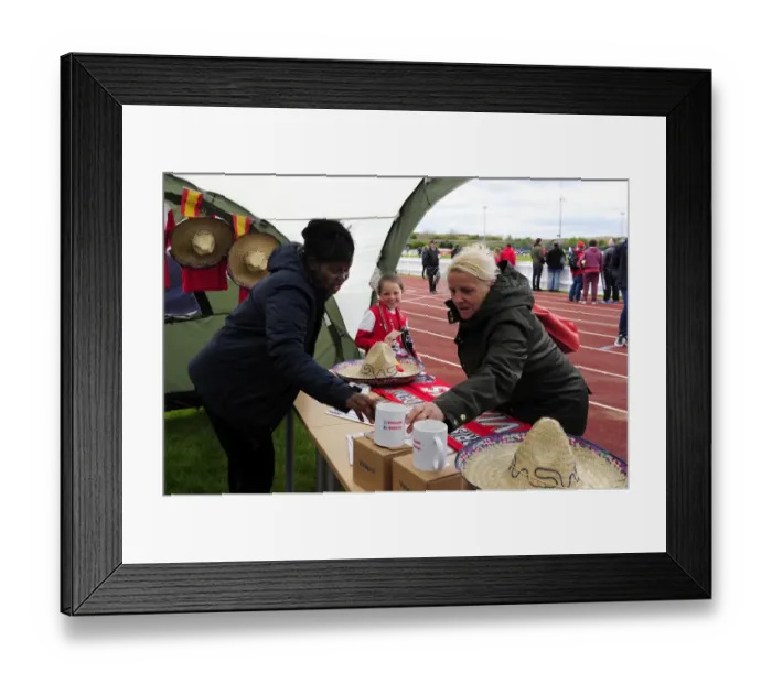 Framed Print : Fan Exploring Bristol Academy Women's Merchandise at Gifford Stadium during BAWFC vs Chelsea Ladies Match