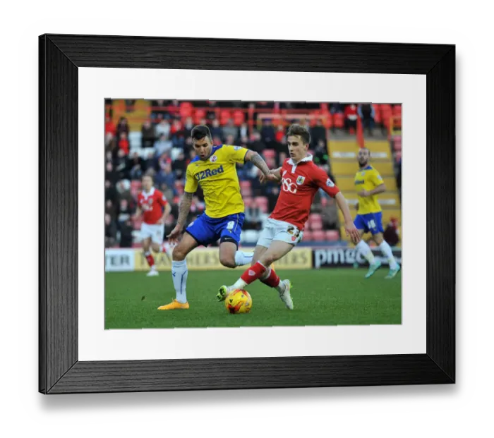 Framed Print : Bristol City's Joe Bryan Fends Off Jimmy Smith's Pressure During Sky Bet League One Clash Framed Print : Bristol City's Joe Bryan Fends Off Jimmy Smith's Pressure During Sky Bet League One Clash