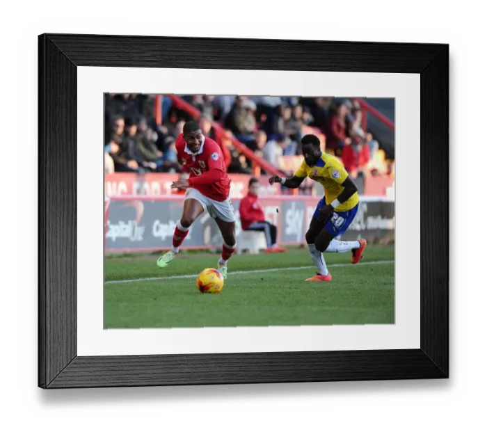 Framed Print : Mark Little Outmuscles Bobson Bawling in Bristol City's Victory over Crawley Town