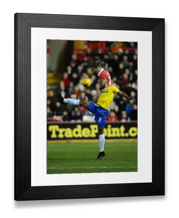 Framed Print : Battling for Supremacy: Bryans vs Oyebanjo in the Sky Bet League One Clash between Bristol City and Crawley Town