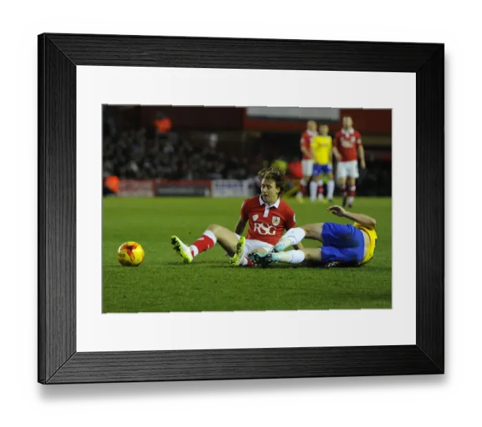 Framed Print : Battling for Supremacy: Luke Freeman Fights for the Ball in Bristol City's Victory over Crawley Town Framed Print : Battling for Supremacy: Luke Freeman Fights for the Ball in Bristol City's Victory over Crawley Town