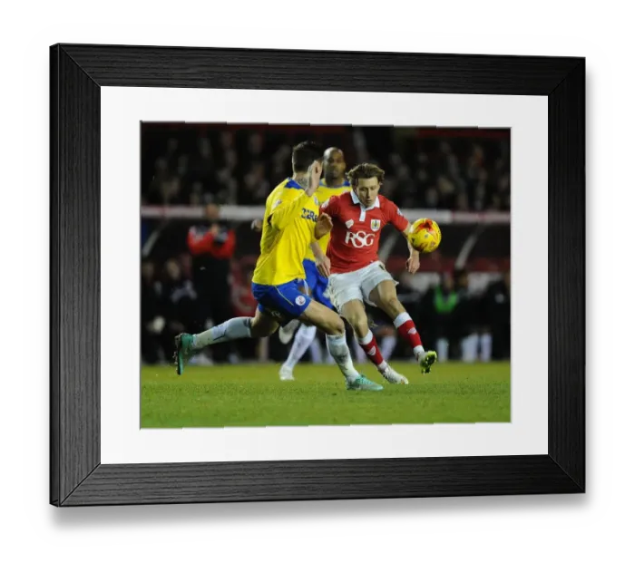 Framed Print : Bristol City's Luke Freeman Soars Over Sonny Bradley - Sky Bet League One Clash at Ashton Gate Framed Print : Bristol City's Luke Freeman Soars Over Sonny Bradley - Sky Bet League One Clash at Ashton Gate