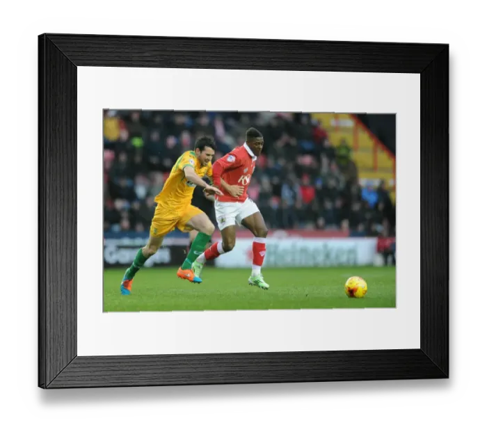 Framed Print : Bristol City vs Yeovil Town: Intense Battle for the Ball - Kieran Agard vs Brendan Moloney Framed Print : Bristol City vs Yeovil Town: Intense Battle for the Ball - Kieran Agard vs Brendan Moloney