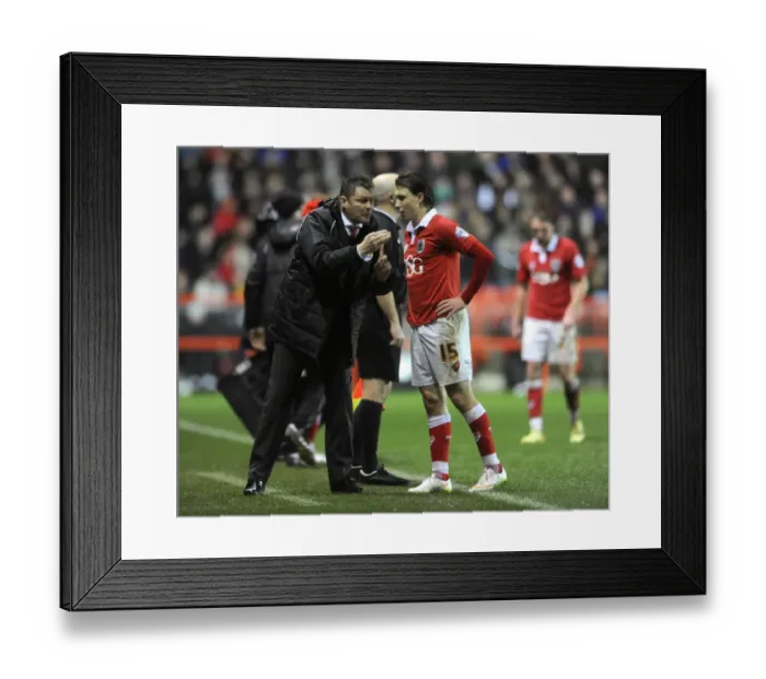 Framed Print : Steve Cotterill Conferes with Luke Freeman during Bristol City's Match against Yeovil Town, December 2014