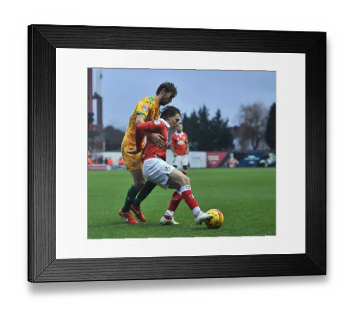 Framed Print : Bristol City's Luke Freeman Fends Off Sam Foley's Pressure During Sky Bet League One Clash