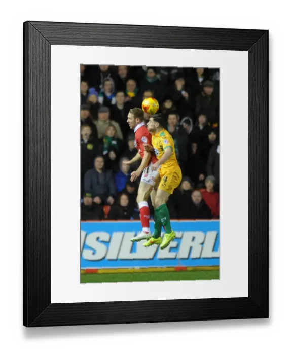 Framed Print : Bristol City vs Yeovil Town: Intense Aerial Battle - December 2014