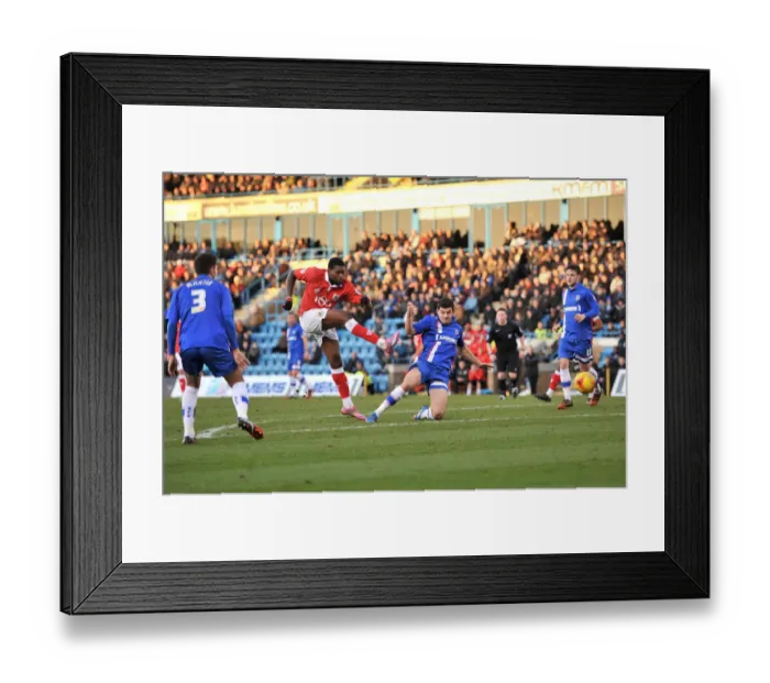 Framed Print : Bristol City's Jay Emmanuel-Thomas Goes for Glory against Gillingham