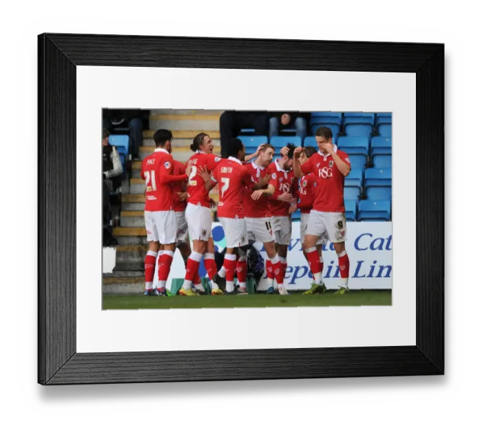 Framed Print : Bristol City's Matt Smith Doubles the Joy: Celebrating at Priestfield Stadium (December 2014)