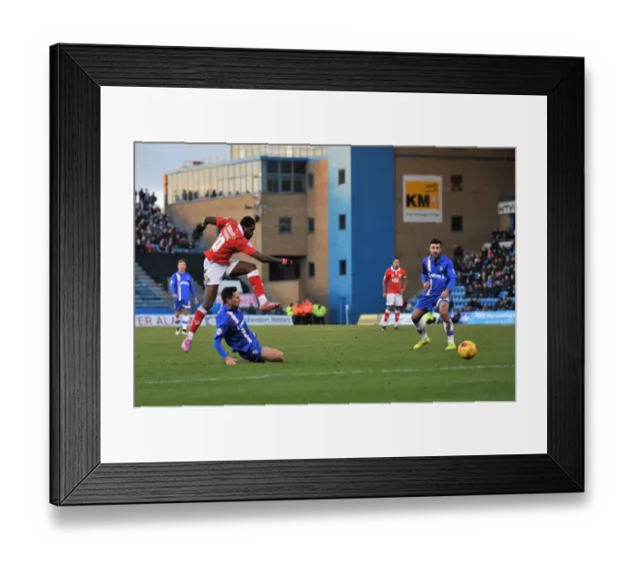 Framed Print : Bristol City's Jay Emmanuel-Thomas Aiming for the Winning Goal against Gillingham