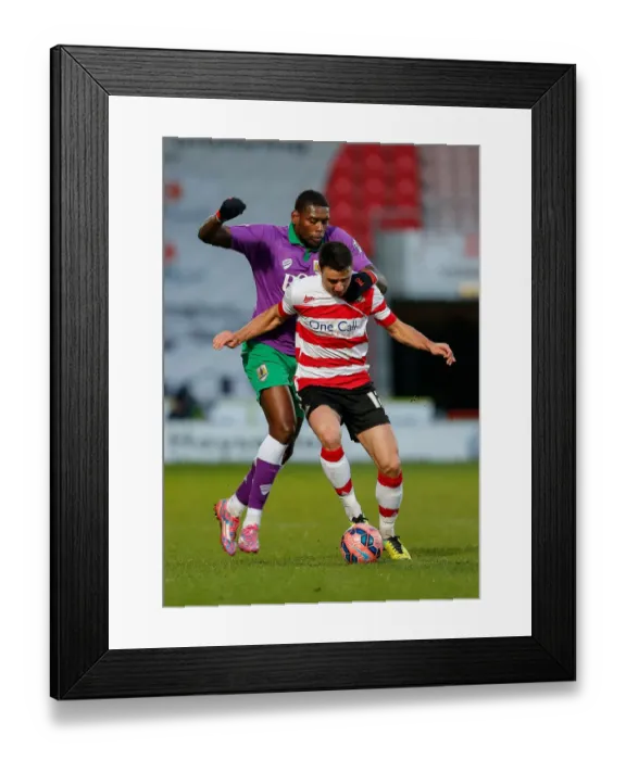 Framed Print : Jay Emmanuel-Thomas Dispossessed by Enda Stevens in Doncaster Rovers vs. Bristol City FA Cup Clash Framed Print : Jay Emmanuel-Thomas Dispossessed by Enda Stevens in Doncaster Rovers vs. Bristol City FA Cup Clash