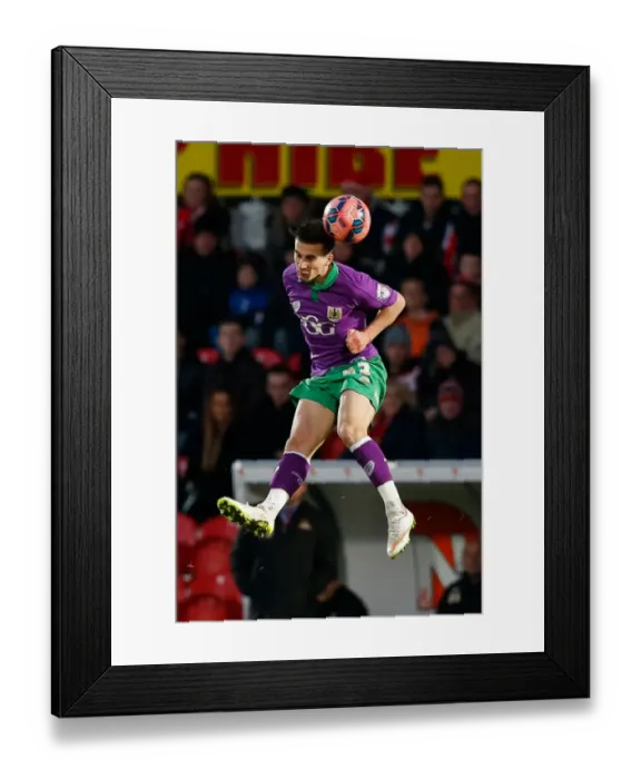 Framed Print : Bristol City's Joe Bryan Heads the Ball in FA Cup Third Round Proper Match Against Doncaster Rovers Framed Print : Bristol City's Joe Bryan Heads the Ball in FA Cup Third Round Proper Match Against Doncaster Rovers