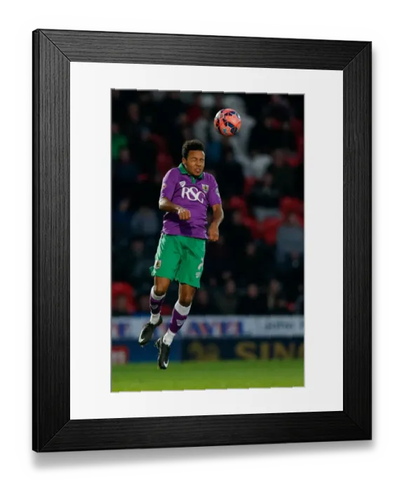 Framed Print : Bristol City's Korey Smith Heads the Ball in FA Cup Third Round Proper Match Against Doncaster Rovers Framed Print : Bristol City's Korey Smith Heads the Ball in FA Cup Third Round Proper Match Against Doncaster Rovers