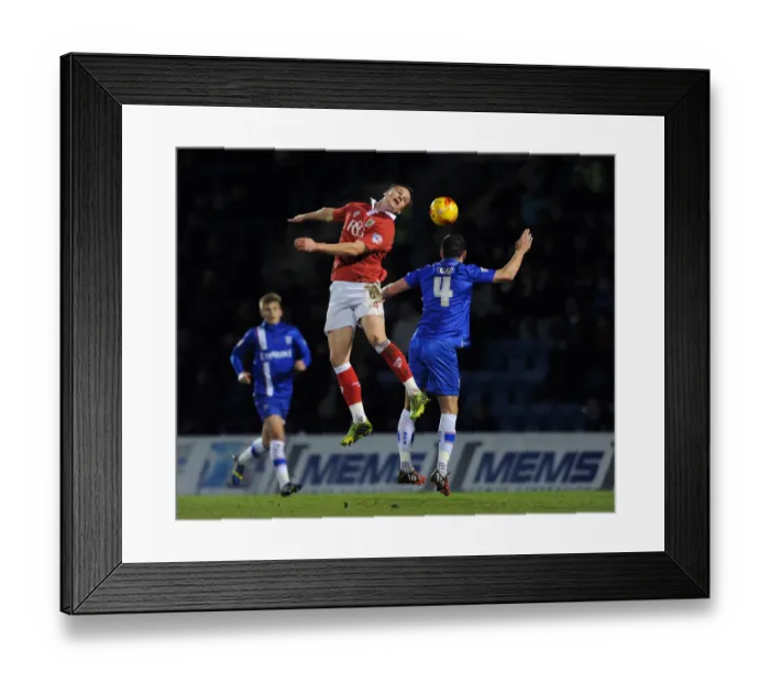 Framed Print : Bristol City vs Gillingham: Intense Header Battle - January 6, 2015 Framed Print : Bristol City vs Gillingham: Intense Header Battle - January 6, 2015