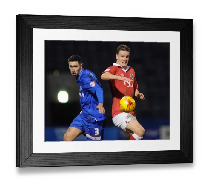 Framed Print : Intense Battle for the Ball: Bristol City vs Gillingham - Johnstone's Paint Trophy Area Final, Priestfield Stadium Framed Print : Intense Battle for the Ball: Bristol City vs Gillingham - Johnstone's Paint Trophy Area Final, Priestfield Stadium