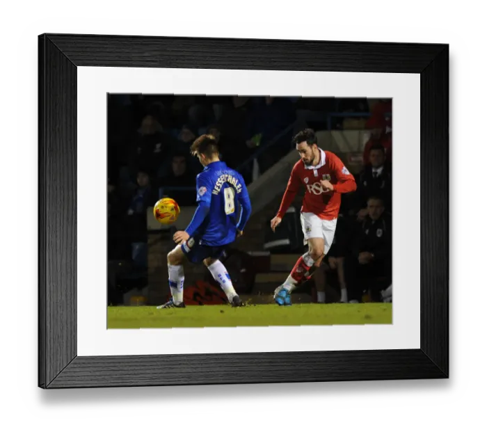 Framed Print : Derrick Williams of Bristol City Battles Past Jake Hessenthaler in Johnstone's Paint Trophy Clash at Priestfield Stadium Framed Print : Derrick Williams of Bristol City Battles Past Jake Hessenthaler in Johnstone's Paint Trophy Clash at Priestfield Stadium