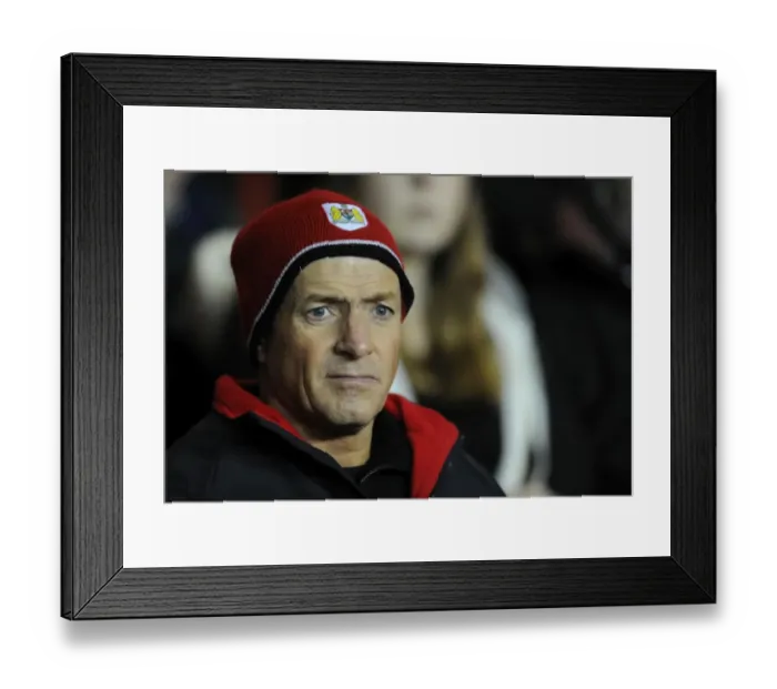 Framed Print : Passionate Bristol City Fan Celebrates at Ashton Gate Stadium during FA Cup Third Round Replay