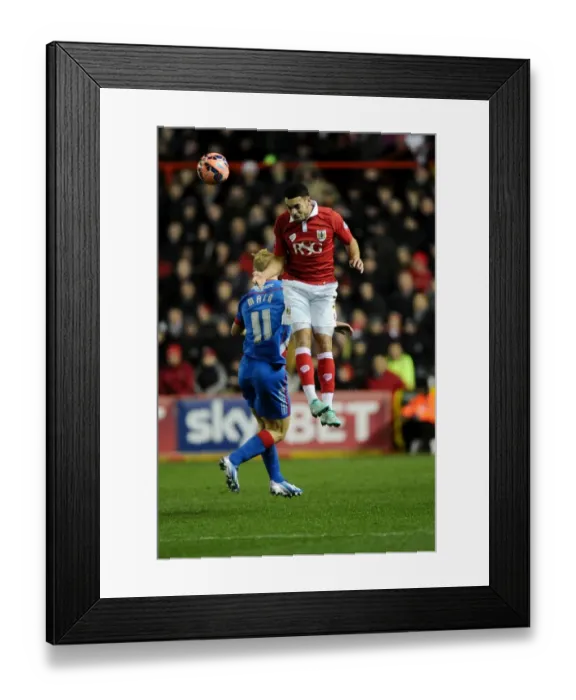 Framed Print : Battling for Supremacy: Derrick Williams vs. Curtis Main at Ashton Gate Stadium