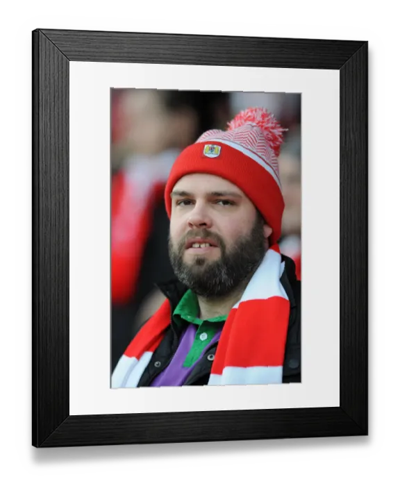 Framed Print : Passionate Bristol City Fans in Action at Ashton Gate during FA Cup Fourth Round Match against West Ham United