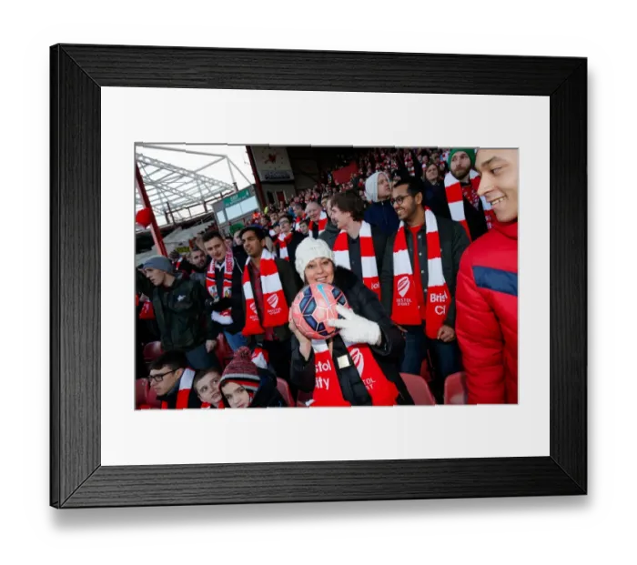 Framed Print : Bristol City FC: A Fan with the Matchball Before the Bristol City vs. West Ham United FA Cup Match, 2015