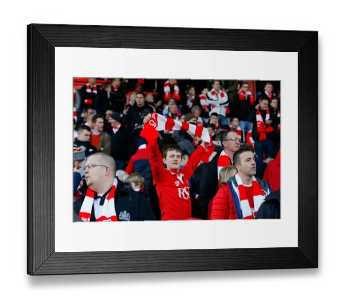 Framed Print : Bristol City Fan Waves Scarf at Ashton Gate Stadium During FA Cup Match vs. West Ham United Framed Print : Bristol City Fan Waves Scarf at Ashton Gate Stadium During FA Cup Match vs. West Ham United
