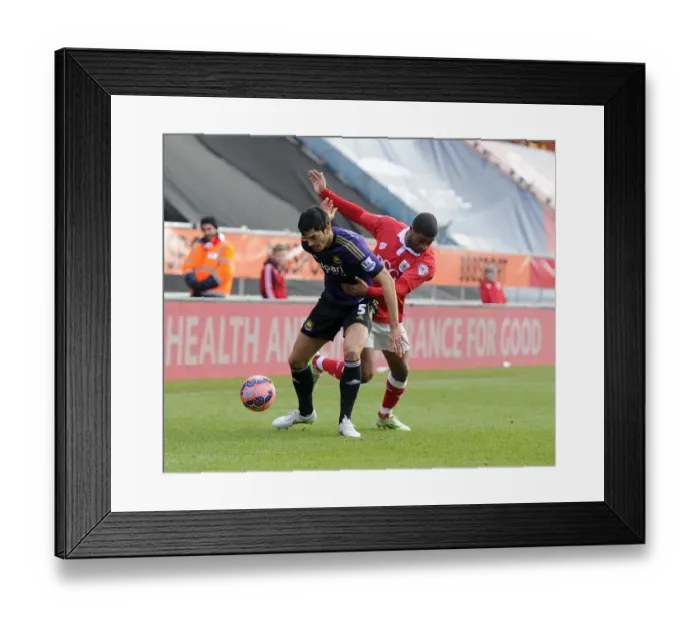Framed Print : Battling for Supremacy: Mark Little vs. James Tomkins in the FA Cup Fourth Round Clash between Bristol City and West Ham United Framed Print : Battling for Supremacy: Mark Little vs. James Tomkins in the FA Cup Fourth Round Clash between Bristol City and West Ham United