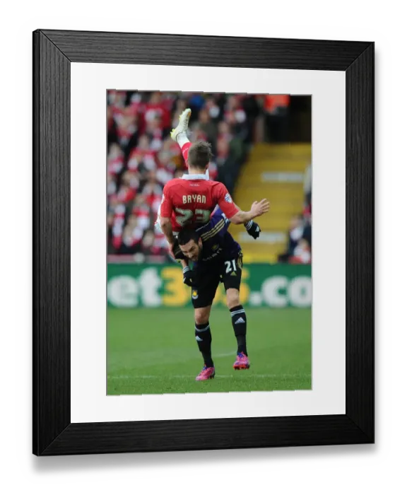 Framed Print : Bristol City vs West Ham United: Joe Bryan Fouled by Amalfitano in FA Cup Clash Framed Print : Bristol City vs West Ham United: Joe Bryan Fouled by Amalfitano in FA Cup Clash
