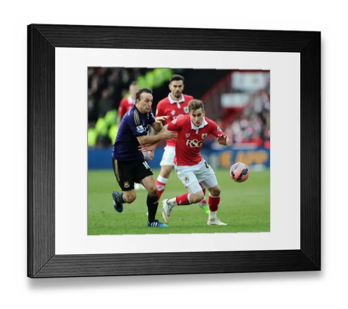 Framed Print : Battling for Supremacy: Bryan vs. Noble in the FA Cup Fourth Round Clash between Bristol City and West Ham United Framed Print : Battling for Supremacy: Bryan vs. Noble in the FA Cup Fourth Round Clash between Bristol City and West Ham United