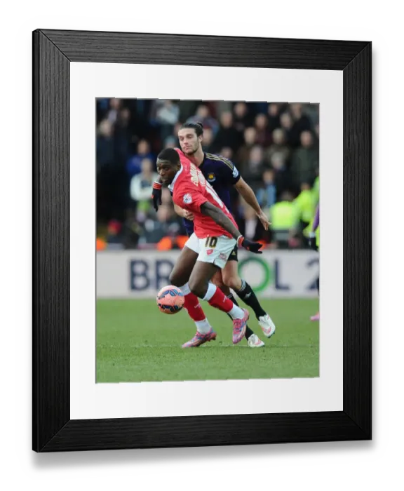 Framed Print : Battling for Supremacy: Jay Emmanuel-Thomas vs. Andy Carroll in the FA Cup Fourth Round Clash between Bristol City and West Ham United Framed Print : Battling for Supremacy: Jay Emmanuel-Thomas vs. Andy Carroll in the FA Cup Fourth Round Clash between Bristol City and West Ham United