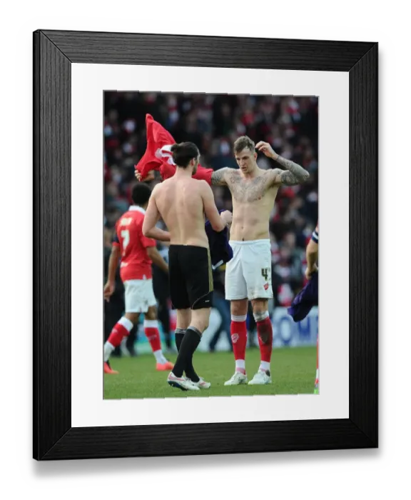 Framed Print : Aden Flint and Andy Carroll Exchange Shirts: A Moment from Bristol City vs. West Ham United FA Cup Match, January 2015