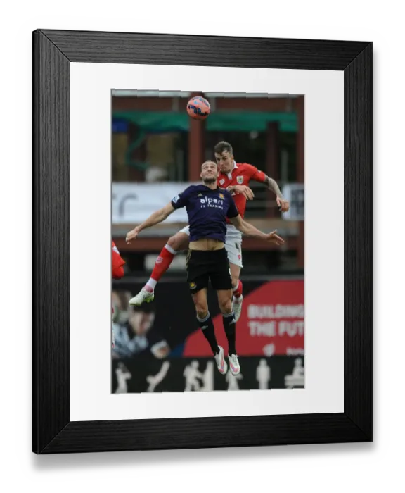Framed Print : Intense Moment: Aden Flint vs. Andy Carroll - FA Cup Fourth Round, Bristol City vs. West Ham United Framed Print : Intense Moment: Aden Flint vs. Andy Carroll - FA Cup Fourth Round, Bristol City vs. West Ham United