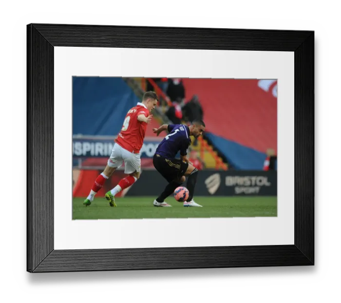 Framed Print : Bristol City vs. West Ham United: Matt Smith vs. Winston Reid - Intense Football Rivalry
