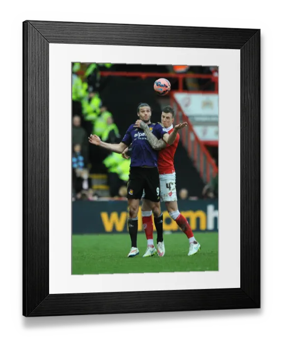 Framed Print : Intense Header Battle: Aden Flint vs Andy Carroll, FA Cup Fourth Round - Bristol City vs West Ham United Framed Print : Intense Header Battle: Aden Flint vs Andy Carroll, FA Cup Fourth Round - Bristol City vs West Ham United