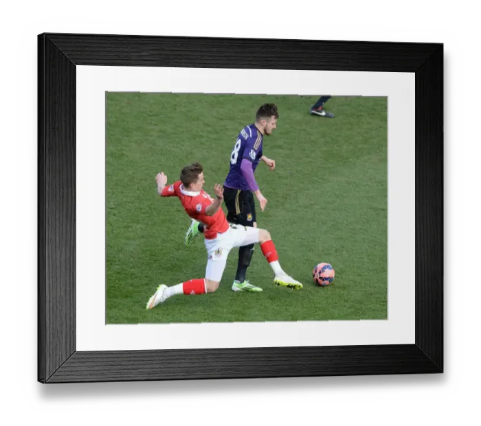 Framed Print : Bristol City's Joe Bryan Tackles Carl Jenkinson in FA Cup Fourth Round Clash Framed Print : Bristol City's Joe Bryan Tackles Carl Jenkinson in FA Cup Fourth Round Clash
