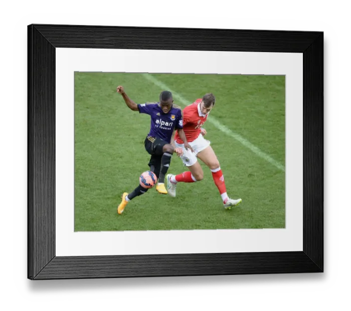 Framed Print : Battling for Supremacy: Aden Flint vs. Enner Valencia in the FA Cup Fourth Round Clash between Bristol City and West Ham United Framed Print : Battling for Supremacy: Aden Flint vs. Enner Valencia in the FA Cup Fourth Round Clash between Bristol City and West Ham United