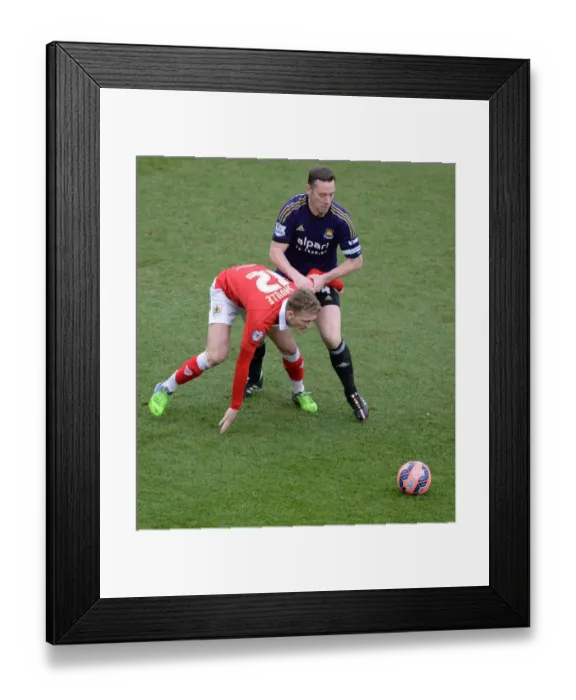 Framed Print : Bristol City vs West Ham: Nolan Fouls Saville in FA Cup Clash Framed Print : Bristol City vs West Ham: Nolan Fouls Saville in FA Cup Clash