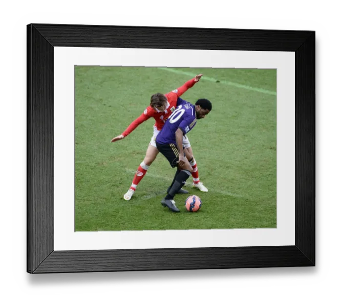 Framed Print : Football Rivalry: Song vs Freeman at Ashton Gate - Bristol City vs West Ham United Framed Print : Football Rivalry: Song vs Freeman at Ashton Gate - Bristol City vs West Ham United
