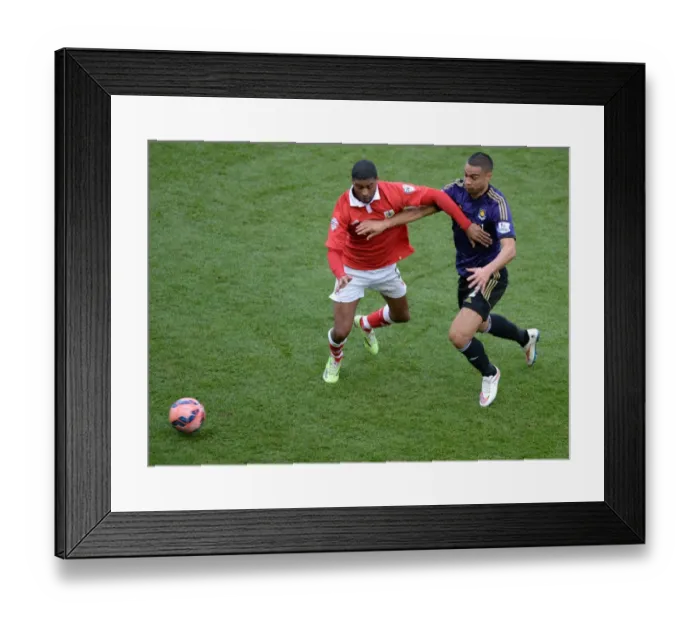 Framed Print : Battling for Supremacy: Derrick Williams vs. Winston Reid in the FA Cup Fourth Round Clash between Bristol City and West Ham United Framed Print : Battling for Supremacy: Derrick Williams vs. Winston Reid in the FA Cup Fourth Round Clash between Bristol City and West Ham United