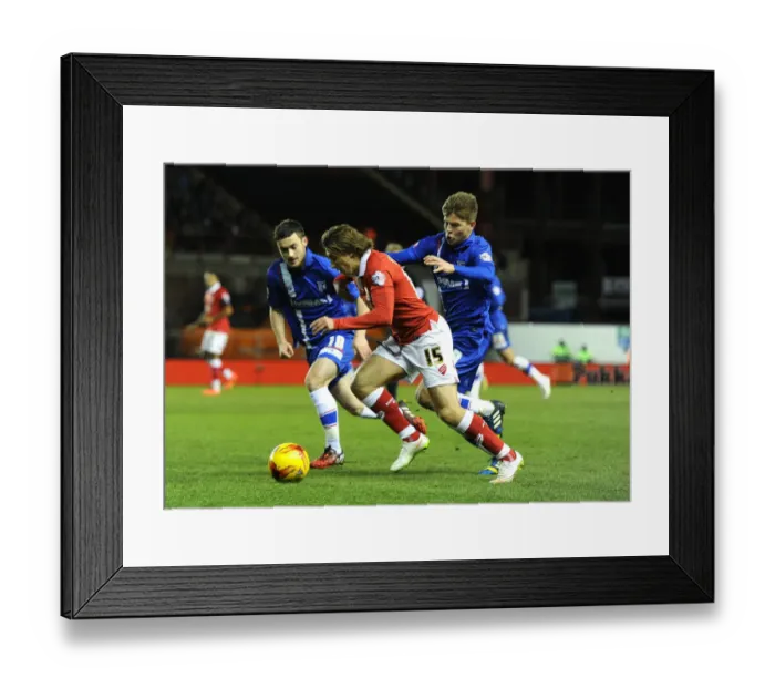 Framed Print : Bristol City's Luke Freeman vs Gillingham's Jake Hessenthaler - Intense Rivalry on the Football Field Framed Print : Bristol City's Luke Freeman vs Gillingham's Jake Hessenthaler - Intense Rivalry on the Football Field