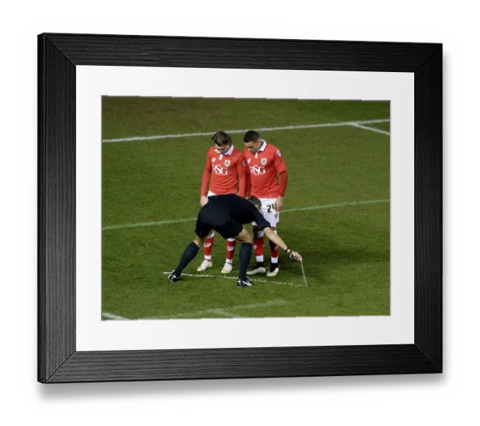 Framed Print : Bristol City vs Gillingham: Referees Marks the Line in Johnstone's Paint Trophy Showdown Framed Print : Bristol City vs Gillingham: Referees Marks the Line in Johnstone's Paint Trophy Showdown
