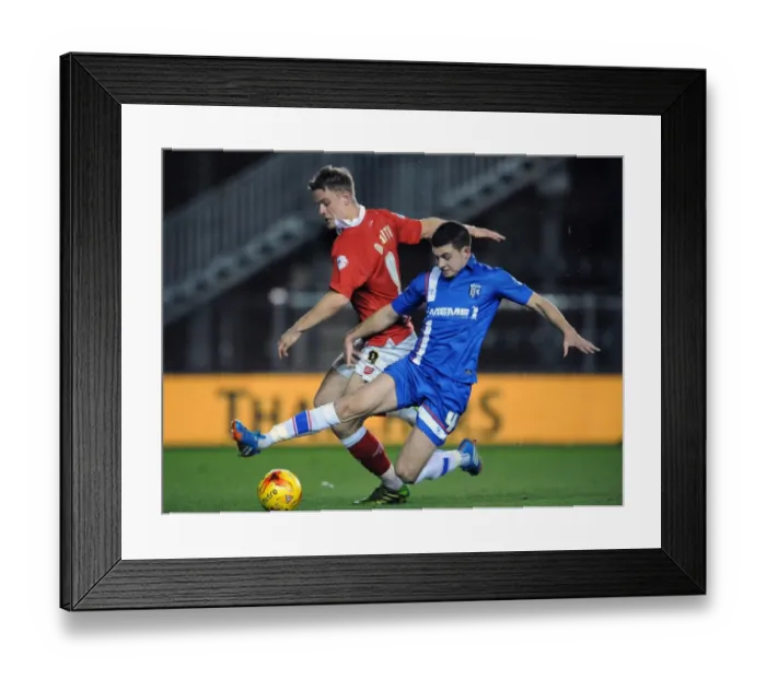 Framed Print : Bristol City vs Gillingham: Matt Smith Tackled by John Egan during Johnstone's Paint Trophy Match Framed Print : Bristol City vs Gillingham: Matt Smith Tackled by John Egan during Johnstone's Paint Trophy Match