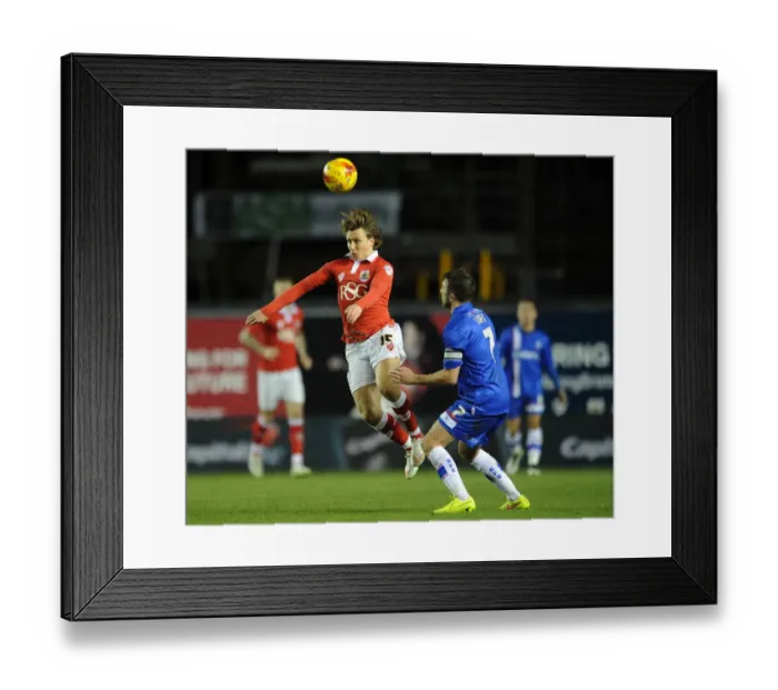 Framed Print : Bristol City vs Gillingham: Luke Freeman Outmuscles Doug Loft in Johnstone's Paint Trophy Clash Framed Print : Bristol City vs Gillingham: Luke Freeman Outmuscles Doug Loft in Johnstone's Paint Trophy Clash