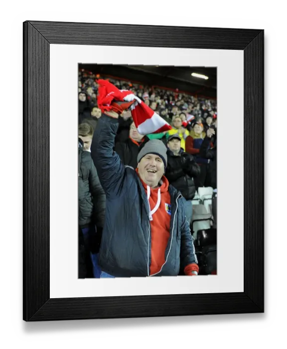 Framed Print : Bristol City Football Club: Exultant Fan Celebrates Victory at Johnstones Paint Trophy South Area Final vs. Gillingham (29 January 2015) Framed Print : Bristol City Football Club: Exultant Fan Celebrates Victory at Johnstones Paint Trophy South Area Final vs. Gillingham (29 January 2015)
