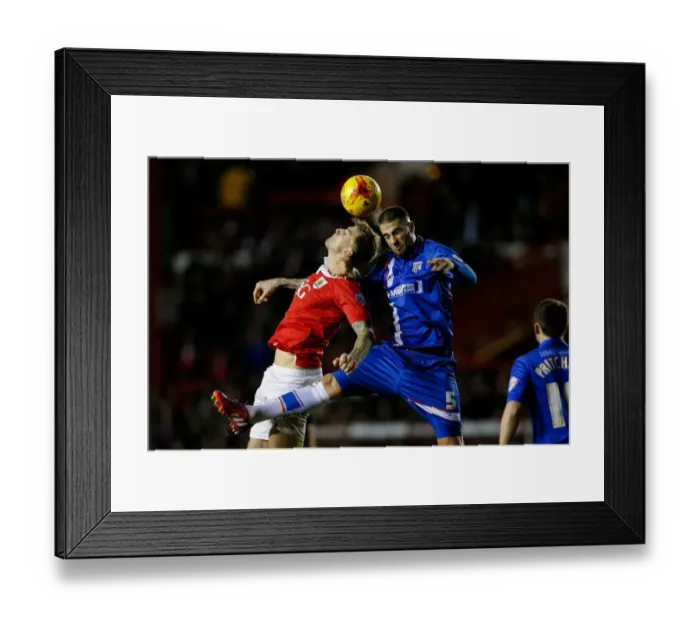 Framed Print : Bristol City vs Gillingham: Aden Flint vs Max Ehmer Aerial Battle Framed Print : Bristol City vs Gillingham: Aden Flint vs Max Ehmer Aerial Battle