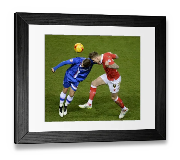 Framed Print : Aden Flint Wins High Ball Against Gillingham's Jake Hessenthaler - Bristol City vs Gillingham, Johnstone's Paint Trophy Southern Area Final