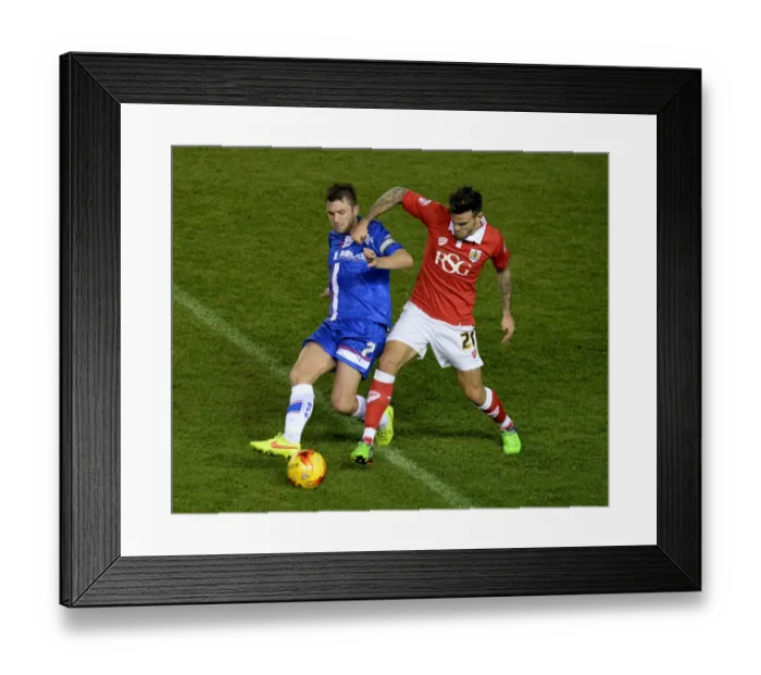 Framed Print : Maron Pack vs Doug Loft: Intense Battle for the Ball during Bristol City vs Gillingham, Johnstone's Paint Trophy Southern Area Final Framed Print : Maron Pack vs Doug Loft: Intense Battle for the Ball during Bristol City vs Gillingham, Johnstone's Paint Trophy Southern Area Final