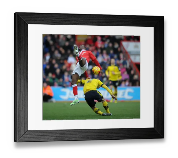 Framed Print : Bristol City vs Fleetwood Town: Intense Aerial Battle Between Kieran Agard and Conor McLaughlin