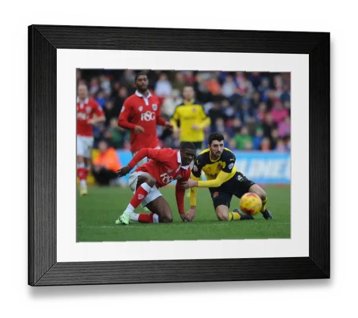 Framed Print : Bristol City vs Fleetwood Town: Agard and McLaughlin Eye the Loose Ball during Sky Bet League One Clash at Ashton Gate