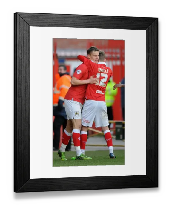Framed Print : Bristol City Celebrates Win Against Fleetwood Town: Matt Smith and George Saville Rejoice on the Field